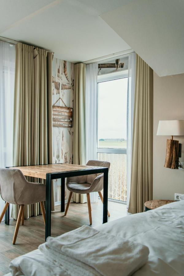 Hotel De Zeeuwse Kust เรอเนสเซอ ภายนอก รูปภาพ